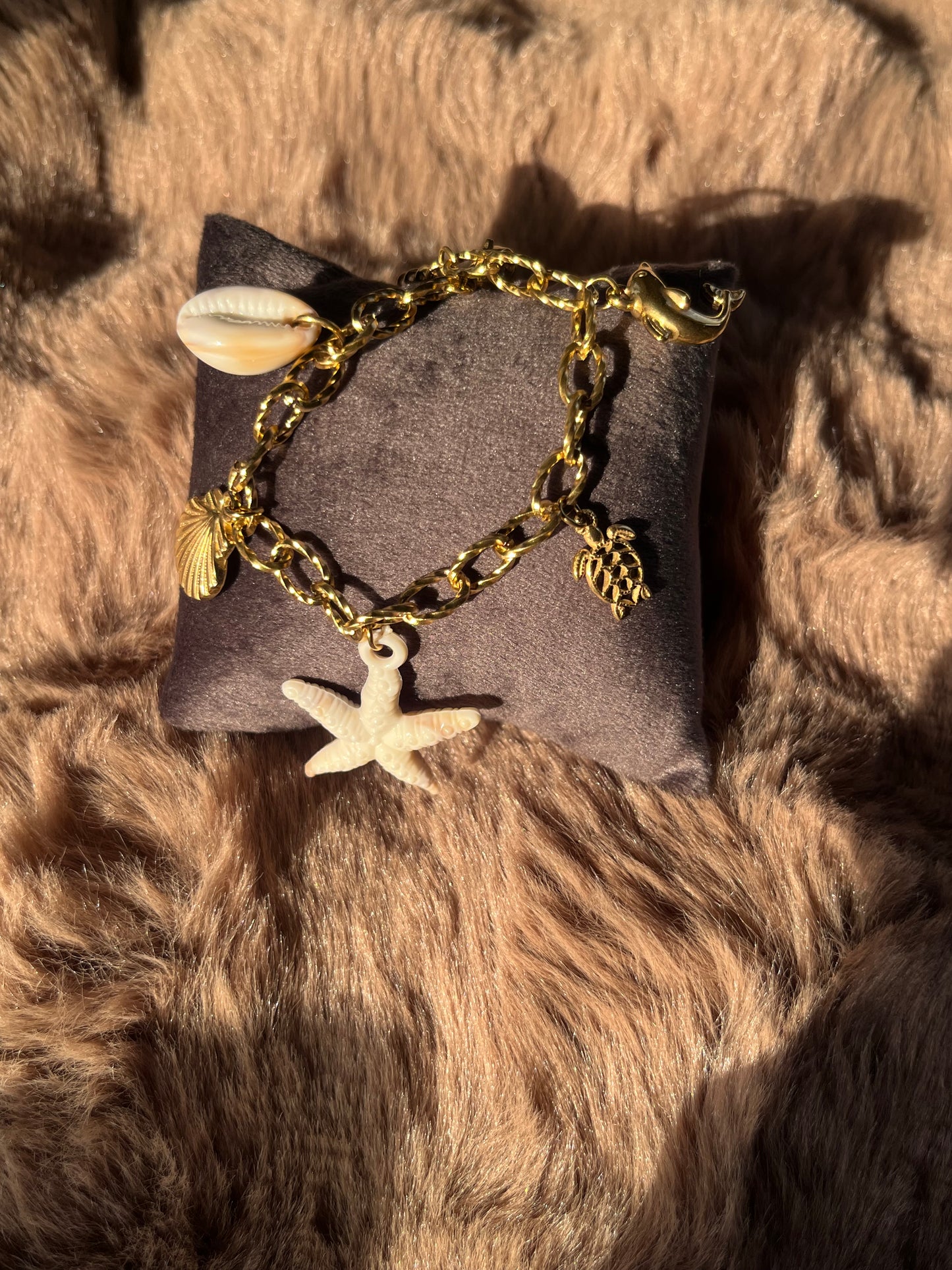 Sea shells and charm bracelet