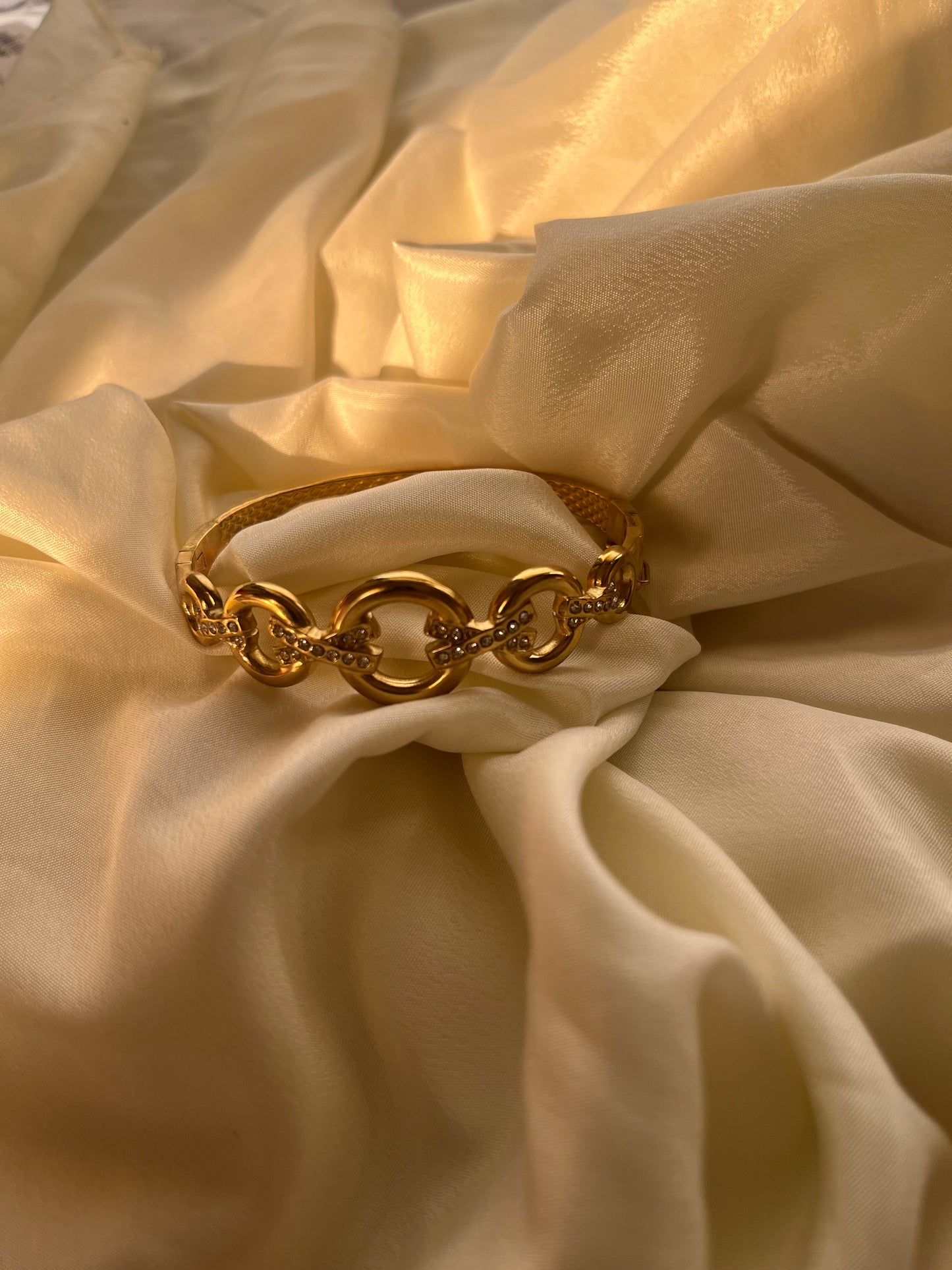 Linked studded cuff